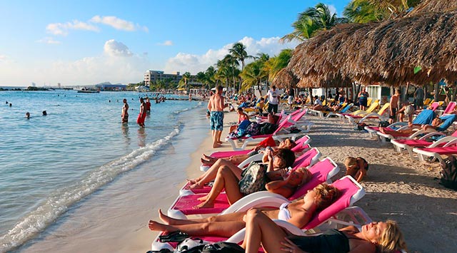 Learn Spanish listening reading beach